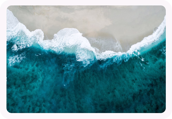 Water washing up on a beach.